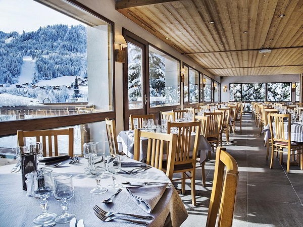 Hotel Alpen Roc dining room with mountain views